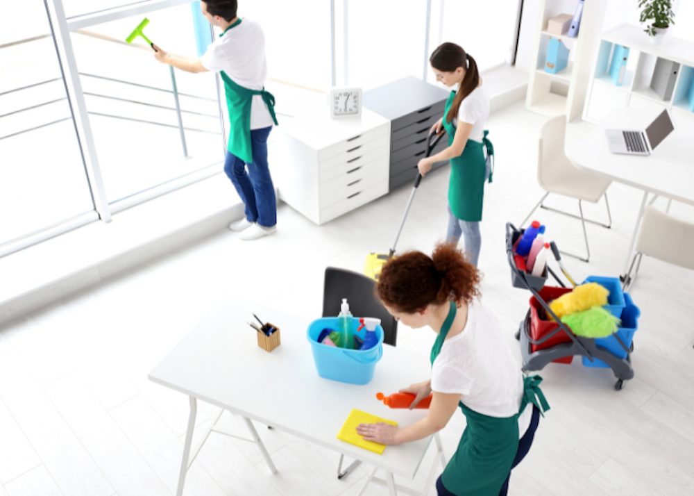 cleaning operatives maintaining an office space